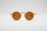 Cream with brown lenses
