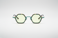 Leopard with green lenses