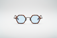 Leopard with blue lenses