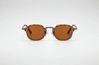 Leopard with brown lenses