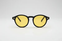 Black with yellow lenses