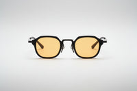 Black with yellow lenses