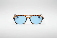 Leopard with blue lenses